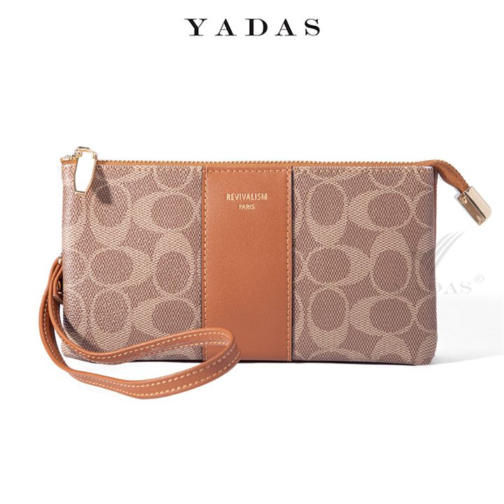 Ellipse monogram zip wristlet wallet in brown